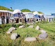 Houses featuring turf roofs and passive solar design Photograph: Martin Bond/Still Pictures