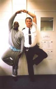 Two yoga practitioners in a Prison Phoenix Trust class at HMP Bullingdon, Oxford Courtesy: PPT Archi