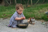Little Zoisa caring for her hens. Photograph: Sophie Poklewski Koziell